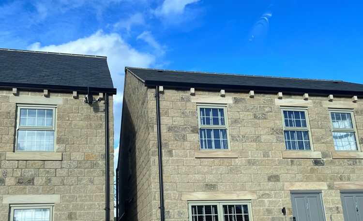 Timber frame house on street Timber frame house