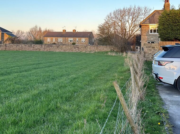 Development land next to house Development land
