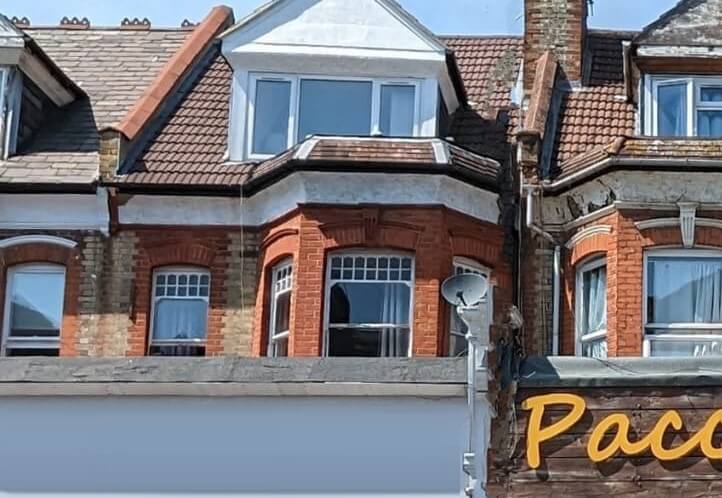 Mixed used property with flats above Mixed used property with flats above