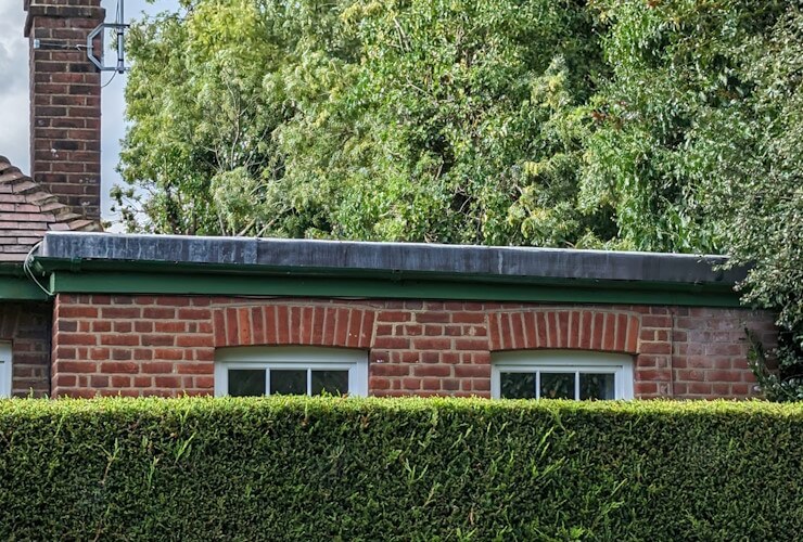 House on street with a flat roof House with a flat roof