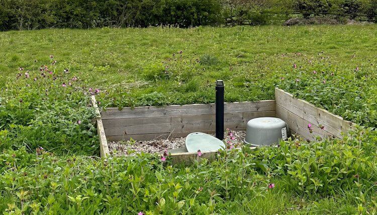 Sewage treatment plant in garden of house Sewage treatment plant in garden